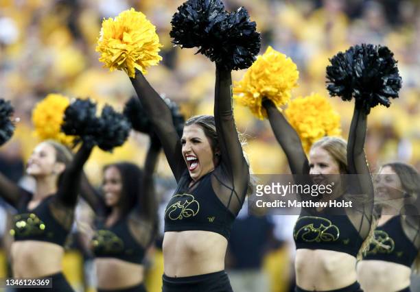 Iowa Dance team members perform during the second half of the match-up between the Iowa Hawkeyes and the Penn State Nittany Lions at Kinnick Stadium...