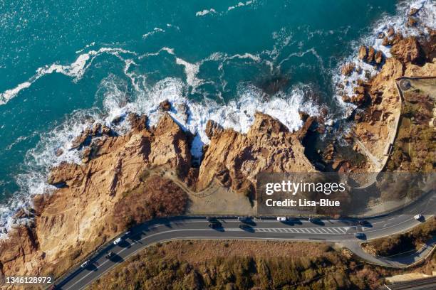 aerial view of coastal road in autumn. - coastal road stock pictures, royalty-free photos & images