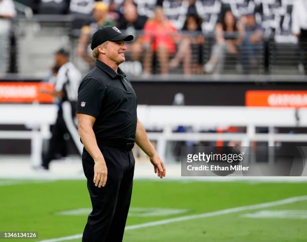 Head coach Jon Gruden of the Las Vegas Raiders walks on the field before a game against the Chicago Bears at Allegiant Stadium on October 10, 2021 in...