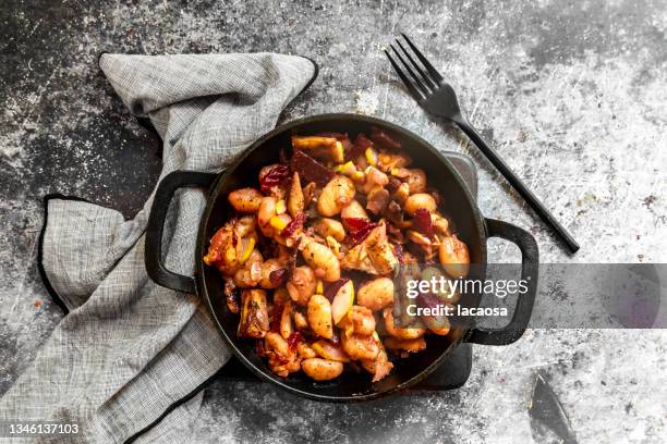 gnocchi with meat substitute, beetroot and pear - gnocchi stock-fotos und bilder