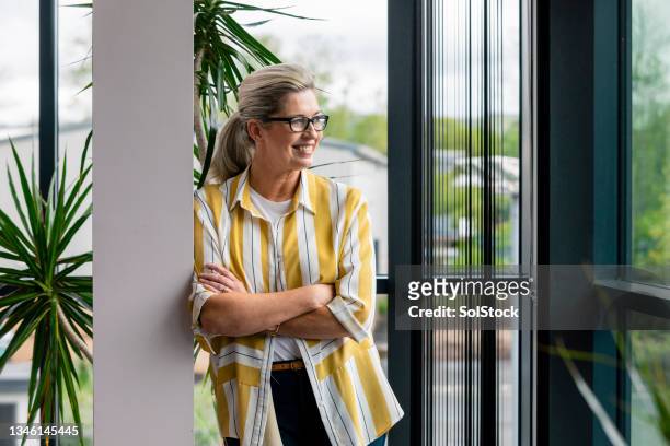 confident office manager - preppy stock pictures, royalty-free photos & images
