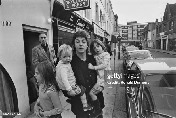 British musician Paul McCartney with his daughters at San Martino, a restaurant at 103 Walton Street in Knightsbridge, London, UK, 28th October 1973....