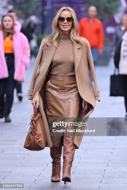 Amanda Holden leaving Heart Breakfast Radio Studios at Global Radio Studios in Leicester Square on October 12, 2021 in London, England.