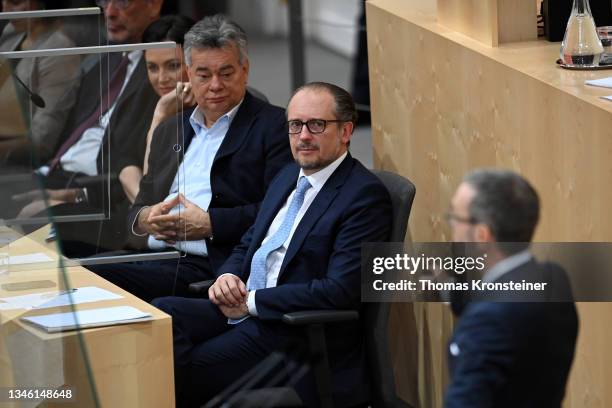 Vice-Chancellor Werner Kogler and newly appointed Austrian chancellor Alexander Schallenberg watch head of the far-right Austrian Freedom Party...