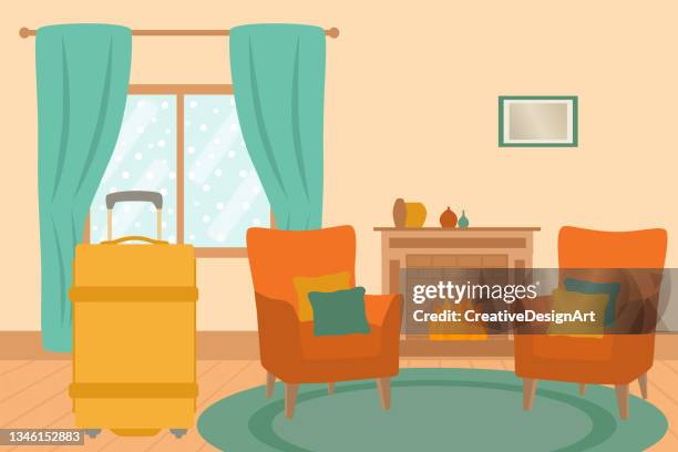 winter holiday concept with yellow luggage, fireplace, armchairs and snow view from the window - cozy winter stock illustrations