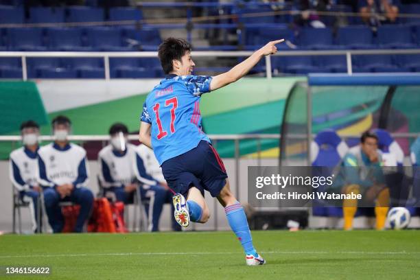 Ao Tanaka of Japan celebrates scoring his side's first goal during the FIFA World Cup Asian qualifier final round Group B match between Japan and...