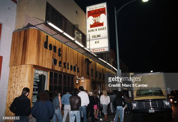 Marquee of the venue "The Troubadour" as a crowd lines up to see the rock group 'Guns n' Roses' perform to their first sold out crowd on November 22,...