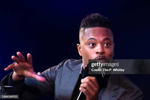 Patrice Evra speaking with Gabby Logan on stage at the 'Prime Video Presents Sport' event at Pan Pacific on October 12, 2021 in London, England. At...