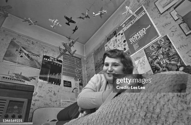 Year-old British novelist and poet Tom Holt in his bedroom at home, UK, 15th March 1974.