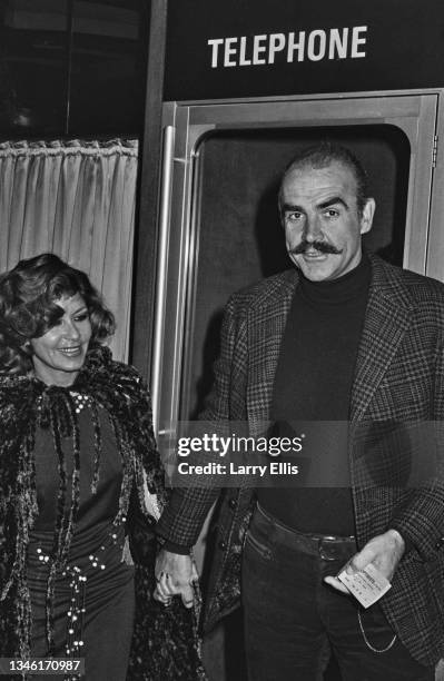 Scottish actor Sean Connery and his partner Micheline Roquebrune at the charity premiere of 'The Optimists of Nine Elms' at the ABC Cinema in London,...