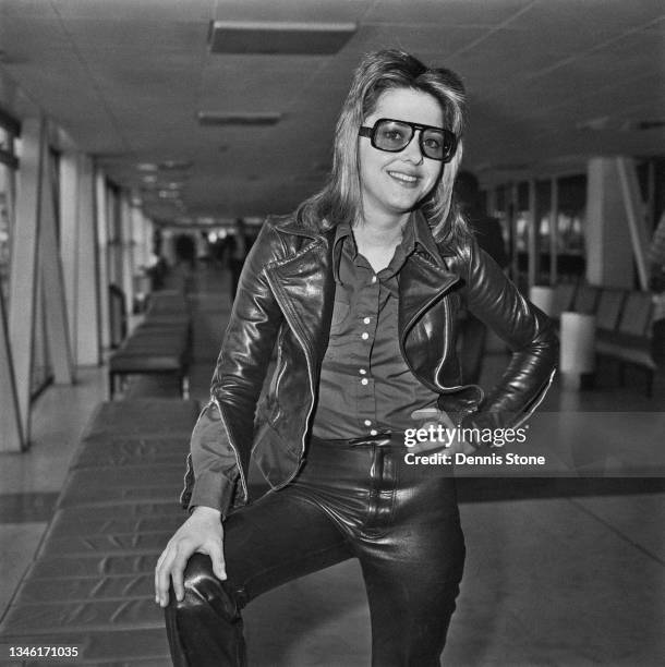 American singer-songwriter and musician Suzi Quatro at Heathrow Airport in London, UK, 9th April 1974.