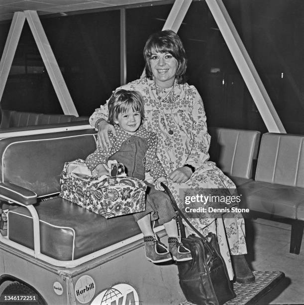 American actress Natalie Wood with her daughter Natasha at Heathrow Airport in London, UK, 10th February 1974. They are leaving for Los Angeles for...