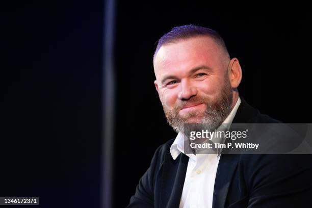 Wayne Rooney speaking with Gabby Logan on stage at the 'Prime Video Presents Sport' event at Pan Pacific on October 12, 2021 in London, England. At...