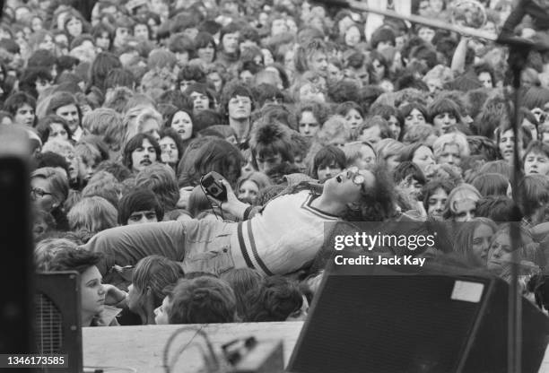 The audience at a benefit concert by Elton John at Vicarage Road, the Watford Football Club ground in Watford, UK, 5th May 1974. Several fans were...