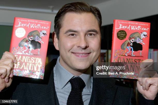 David Walliams signs copies of his children's novel 'Gangsta Granny' at Harrods on December 3, 2011 in London, England.