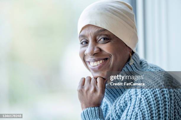 female cancer patient portrait - cancer patient portrait stock pictures, royalty-free photos & images