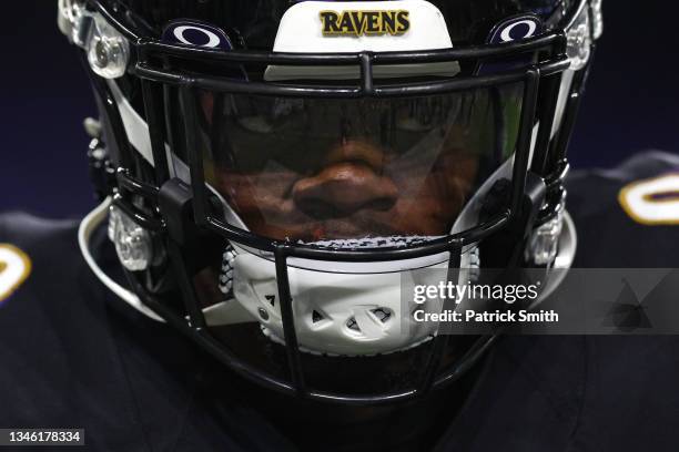 Quarterback Lamar Jackson of the Baltimore Ravens looks on before playing against the Indianapolis Colts at M&T Bank Stadium on October 11, 2021 in...