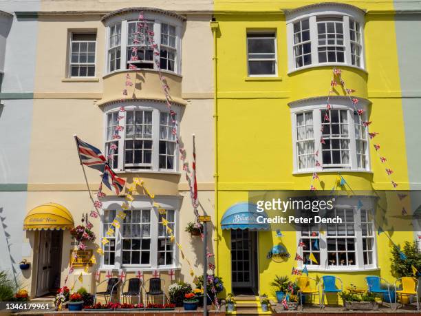 The union flag of Great Britain flies outside a Bed and Breakfast along the esplanade on June 25,2021 in Weymouth, England.