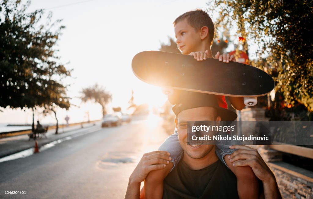 Dad and son on a day out near the sea