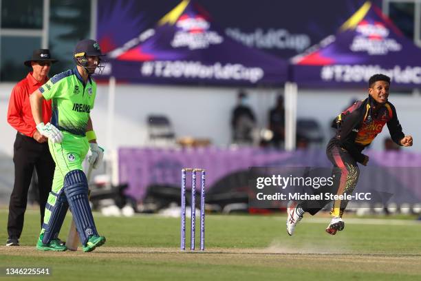 Charles Amini of Paua New Guinea in bowling action during the Papua New Guinea and Ireland warm Up Match prior to the ICC Men's T20 World Cup at on...