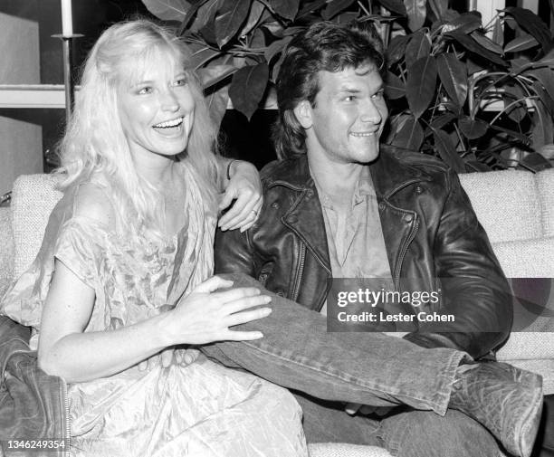 American writer, dancer, choreographer, actress, and director Lisa Niemi and husband American actor, dancer, singer and songwriter Patrick Swayze sit...