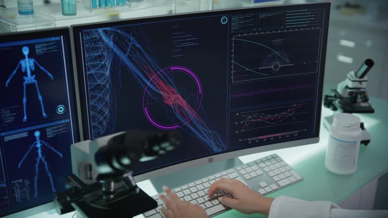 Am Computer Body Laboratory with computers and microscope. Screens with animated human ...
