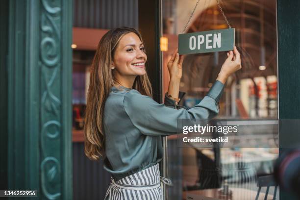 small business owner - opening door stockfoto's en -beelden