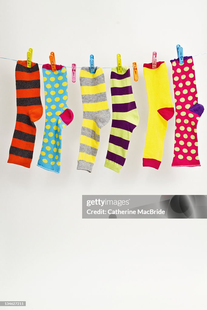 Colorful socks on washing line