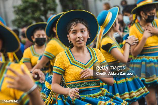 Woman dances during a demonstration against the celebration of Hispanic Day, Spain's National Day, on October 12, 2021 in Madrid, Spain. October 12...