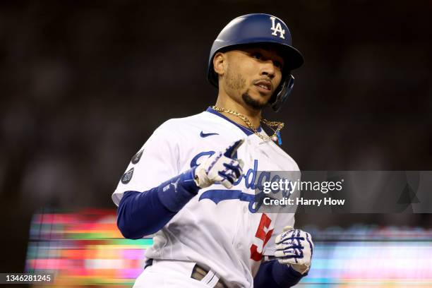 Mookie Betts of the Los Angeles Dodgers celebrates his two run home run against the San Francisco Giants during the fourth inning in game 4 of the...