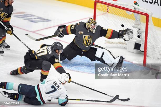 Jordan Eberle of the Seattle Kraken hits the crossbar behind Robin Lehner of the Vegas Golden Knights during the first period of the Kraken's...