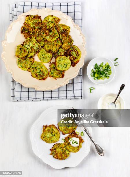 zucchini pancakes - fritter stock pictures, royalty-free photos & images