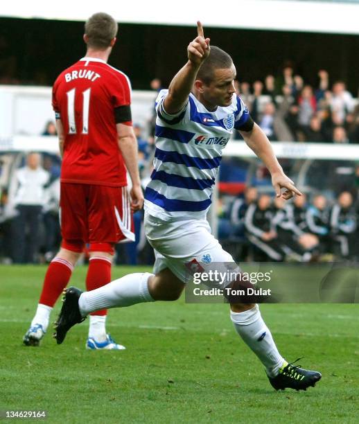 Goalscorer for Queens Park Rangers Heidar Helguson celebrates his opener during the Barclays Premier League match between Queens Park Rangers and...