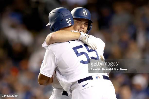 Will Smith celebrates his two run home run with Albert Pujols of the Los Angeles Dodgers against the San Francisco Giants during the eighth inning in...