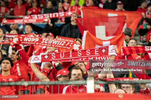 Switzerland fans cheer during the 2022 FIFA World Cup Qualifier match between Switzerland and Northern Ireland at Stade de Geneve on October 9, 2021...