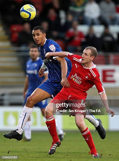 Lewis Montrose of Gillingham battles with Marc Laird of Leyton Orient during the FA Cup Second Round match between Leyton Orient and Gillingham at...