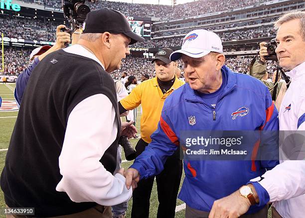 Head coach Rex Ryan of the New York Jets meets with head coach Chan Gailey of the Buffalo Bills after their game on November 27, 2011 at MetLife...