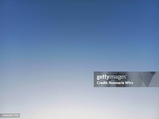 sky above color gradient from light blue to darker blue - powder blue foto e immagini stock