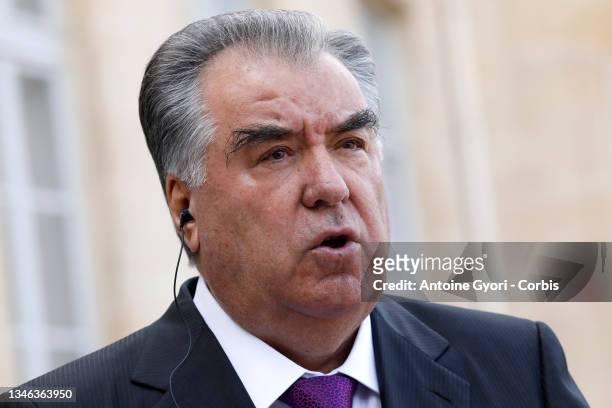 Tajikistan President Emomali Rahmon waves as he arrives at the Elysee Palace for a working lunch with French President Emmanuel Macron on October 13,...