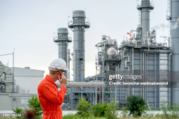 service engineer is working at natural gas combine electric power plant. - carbon cycle stock pictures, royalty-free photos & images