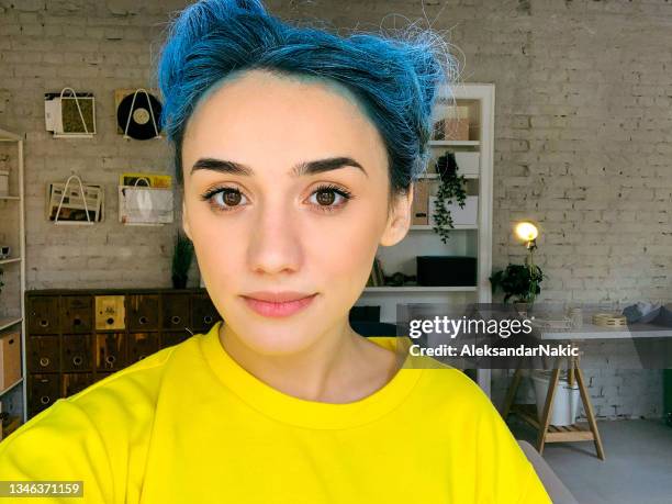 selfie of a young woman with a blue coloured hair - taken on mobile device stock pictures, royalty-free photos & images