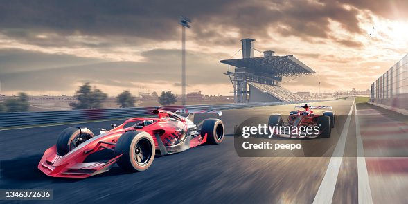 Two Race Cars Moving At High Speed In Slightly Wet Conditions Stock Photo -  Download Image Now - iStock