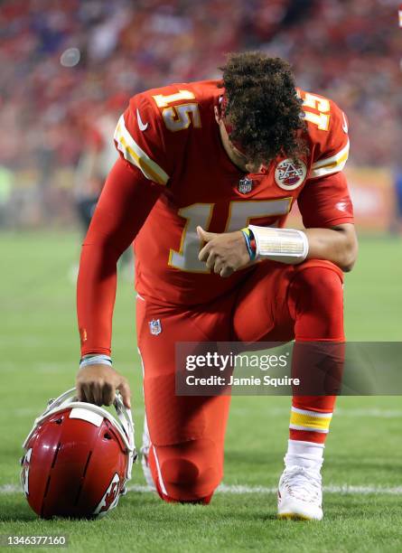 Quarterback Patrick Mahomes of the Kansas City Chiefs prays prior to the game against the Buffalo Bills at Arrowhead Stadium on October 10, 2021 in...