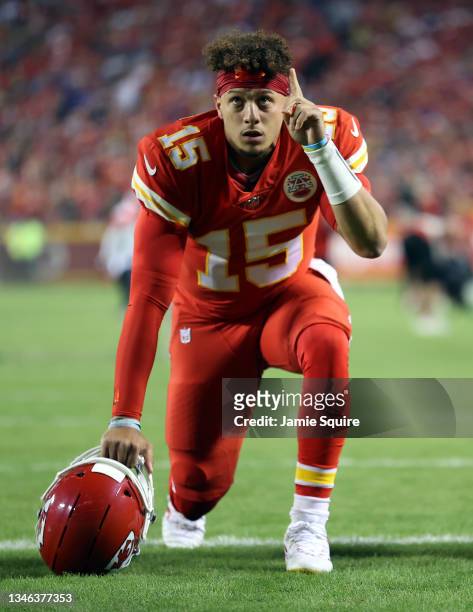 Quarterback Patrick Mahomes of the Kansas City Chiefs prays prior to the game against the Buffalo Bills at Arrowhead Stadium on October 10, 2021 in...