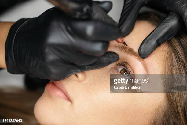 permanent make up treatment - eyebrow stock pictures, royalty-free photos & images