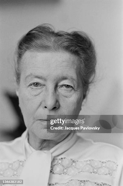 French writer, existentialist philosopher, feminist, and social theorist Simone de Beauvoir at her home in Paris.