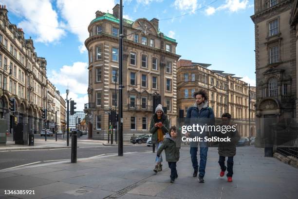 walking through the city - wide shot stock pictures, royalty-free photos & images