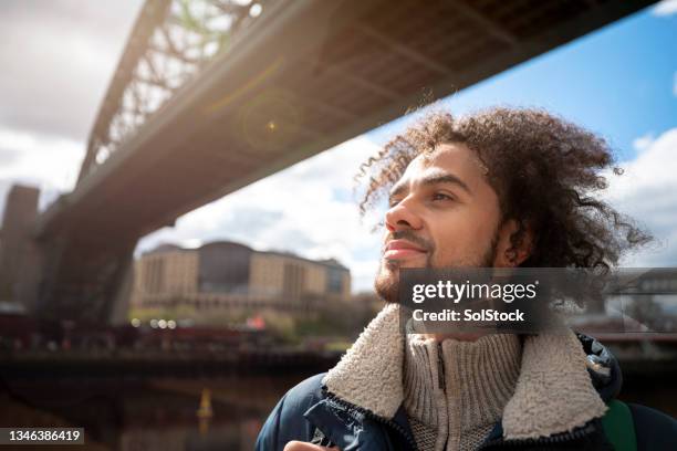 relaxing by the river - man daydreaming stock pictures, royalty-free photos & images