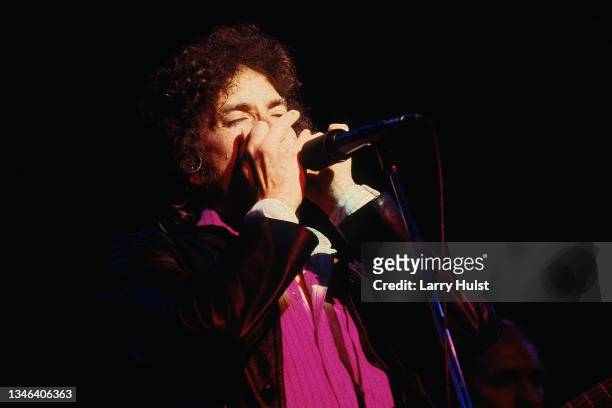 Bob Dylan and his band are performing at the Warfield theater in San Francisco, CA on November 14, 1980.