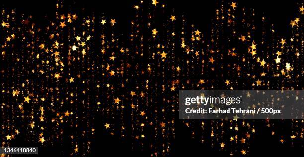 full frame shot of illuminated lights against black background - casino background stock pictures, royalty-free photos & images